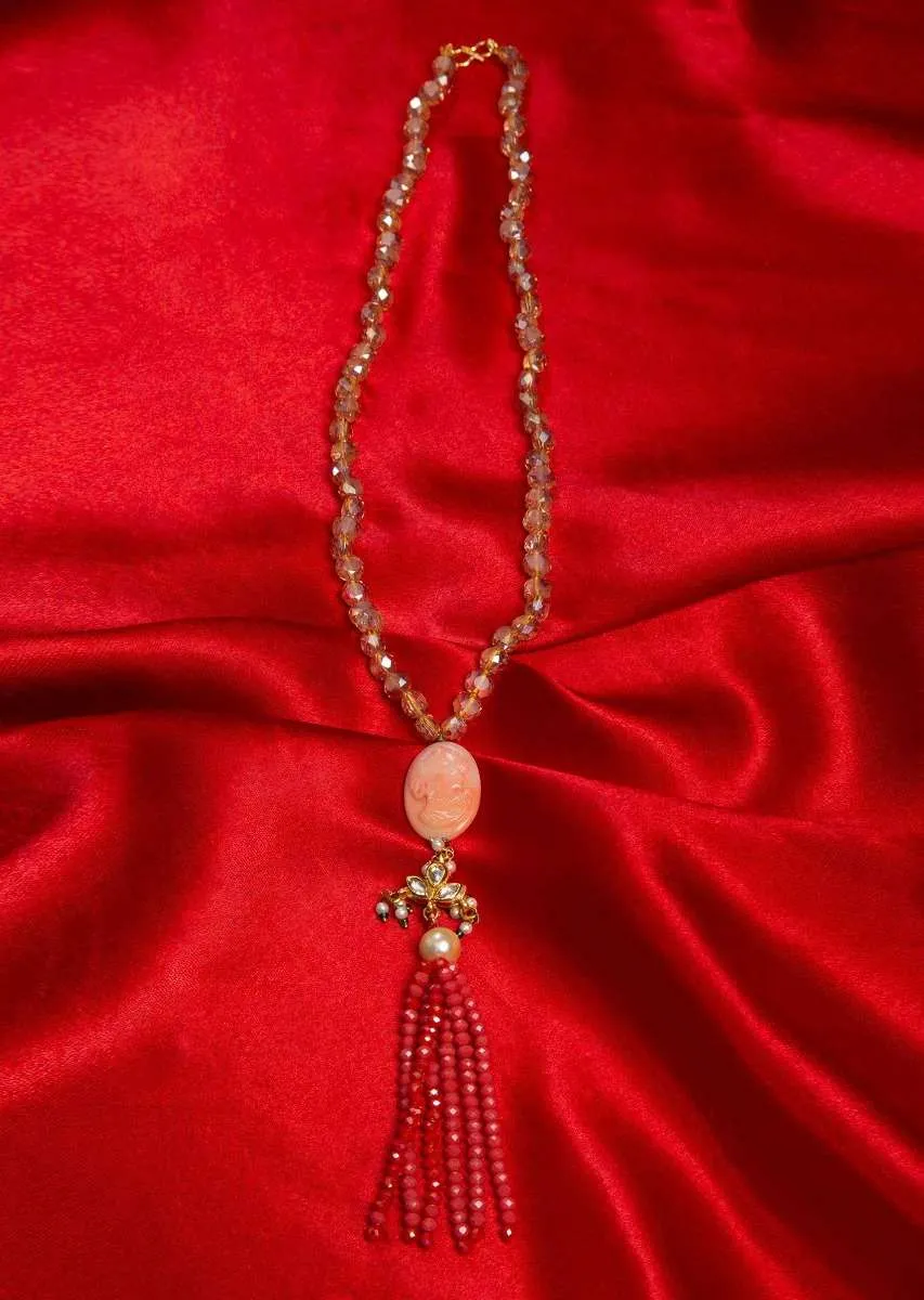 Champaign beaded necklace with self carved beaded pendantwith peach tassel layers only on Kalki