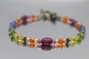 Laura Gibson Bracelet. Sterling Silver with Dangling Faceted Gems - Carnelian Amethyst Tourmaline (299)